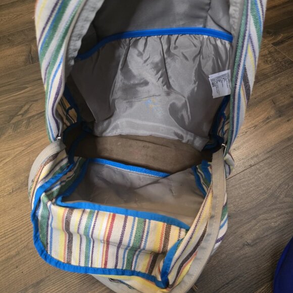 JanSport backpack with striped pattern, suitable for hiking and school.